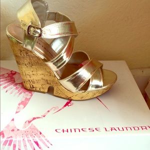 Slightly worn gold wedge sandals with cork bottom